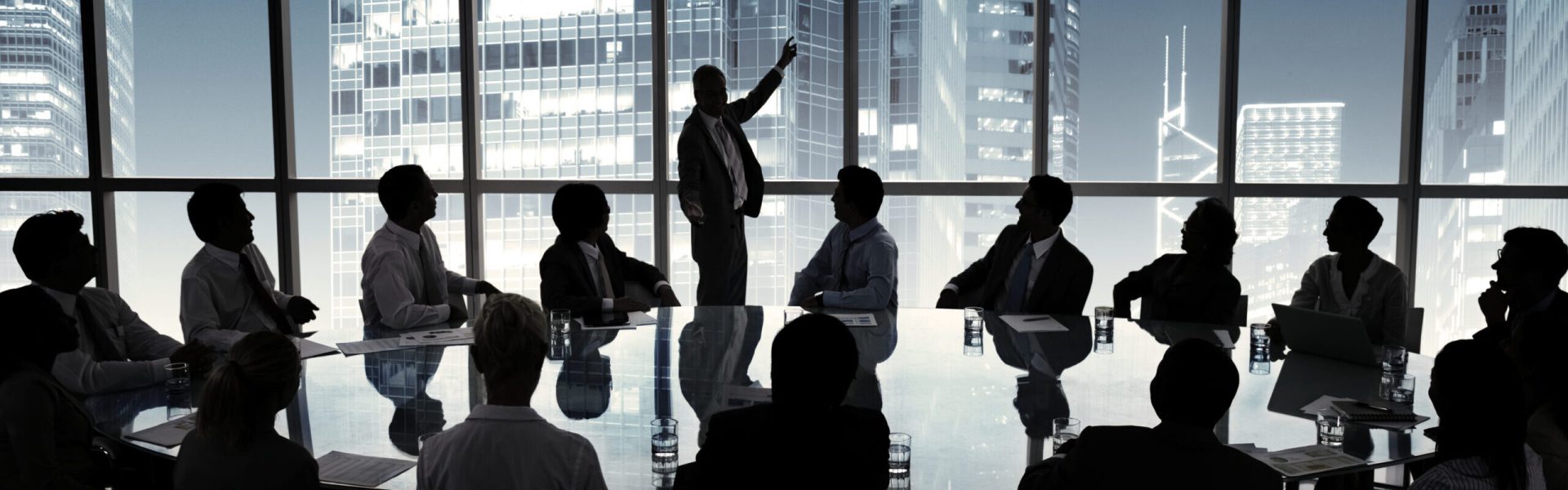 Business people in a board room meeting